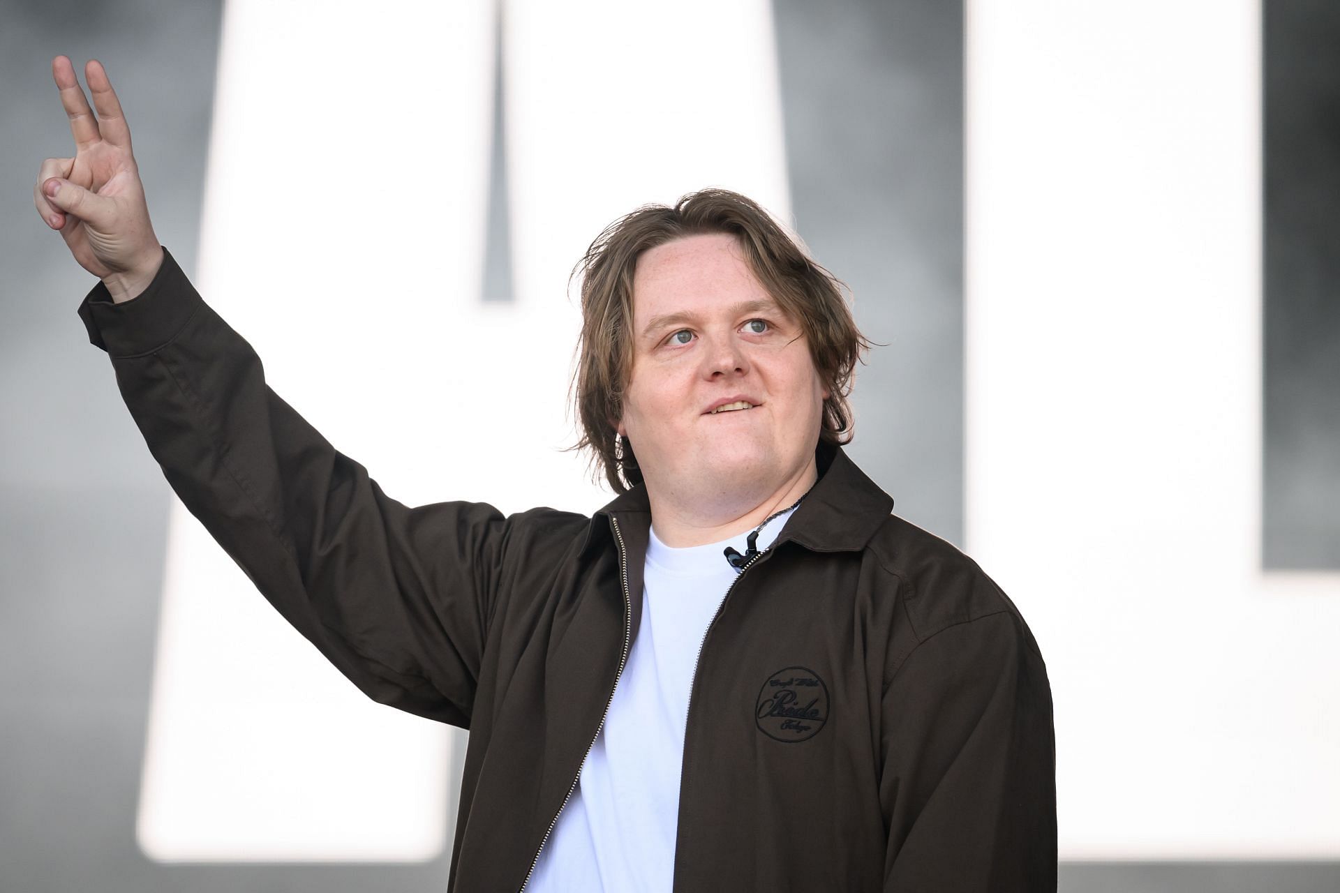 Singer-songwriter Lewis Capaldi walks onto the Pyramid Stage during day three of the Glastonbury festival 2025 - Day Three - (Image via Getty)